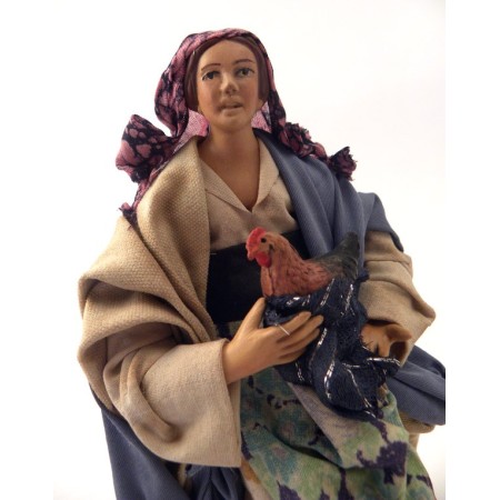Donna con gallina cm 18