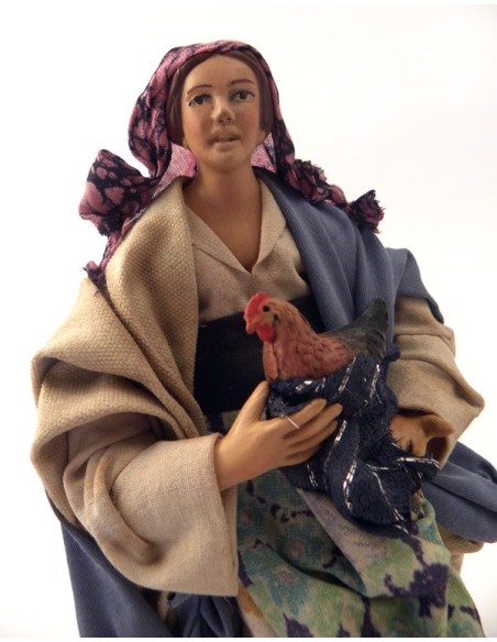 Donna con gallina cm 18